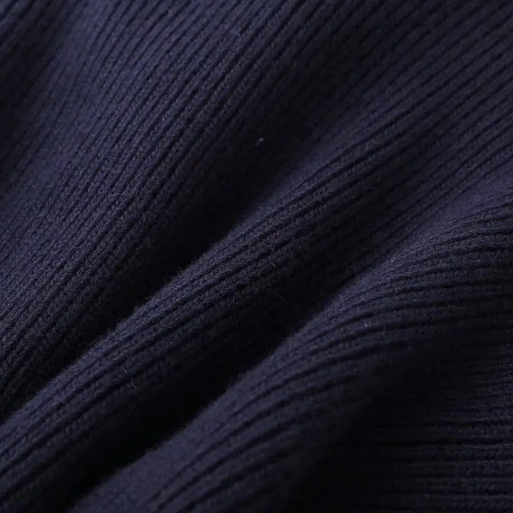 Femke – Gebreid Vest met Denimdetails en Knopen