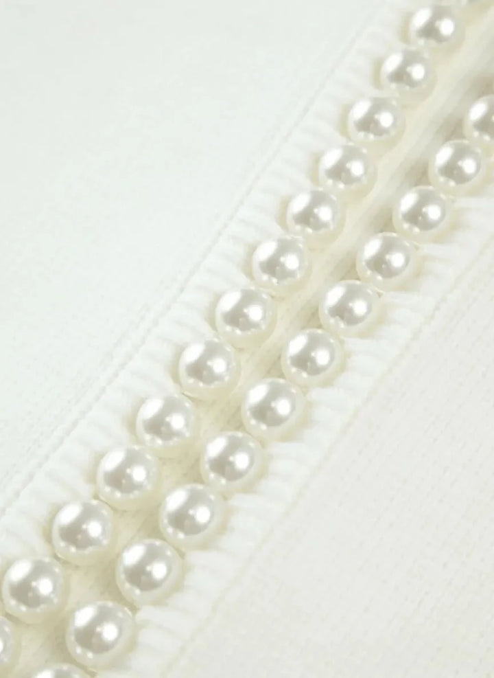 Femke – Elegant Gebreid Vest met Pareldetails